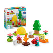 LEGO Duplo Camping Trip playset with Peppa Pig and Daddy Pig figures, tent, campfire, tree, flowers, canoe, mugs, and camera toy for toddlers aged 2+