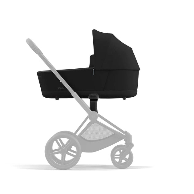 PRIAM Lux Carry Cot Gen 4 in Sepia Black with stroller attachment.