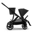 Gazelle S Double Stroller with black frame in side view configuration.