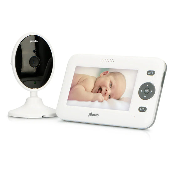 Alecto DVM-140 video baby monitor with 4.3-inch color display and camera showing a baby, white design
