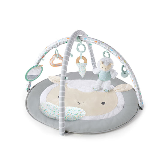 ING Sheppy's Spot Plush Activity Gym for babies with hanging toys and comfy mat for playtime.