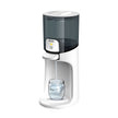 Baby Brezza Instant Warmer dispensing water into a jar.
