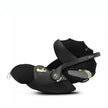 Jeremy Scott Wings Cloud T i-Size infant car seat in black with ergonomic recline and travel system compatibility