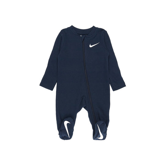 Nike Baby Essential Pointelle Coverall in Midnight Navy with white Swoosh, footed design, and long sleeves for cozy comfort.