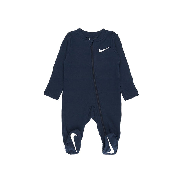 Nike Baby Essential Pointelle Coverall in Midnight Navy with white Swoosh, footed design, and long sleeves for cozy comfort.