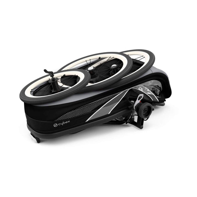Cybex Zeno multisport running stroller folded compactly with wheels detached.
