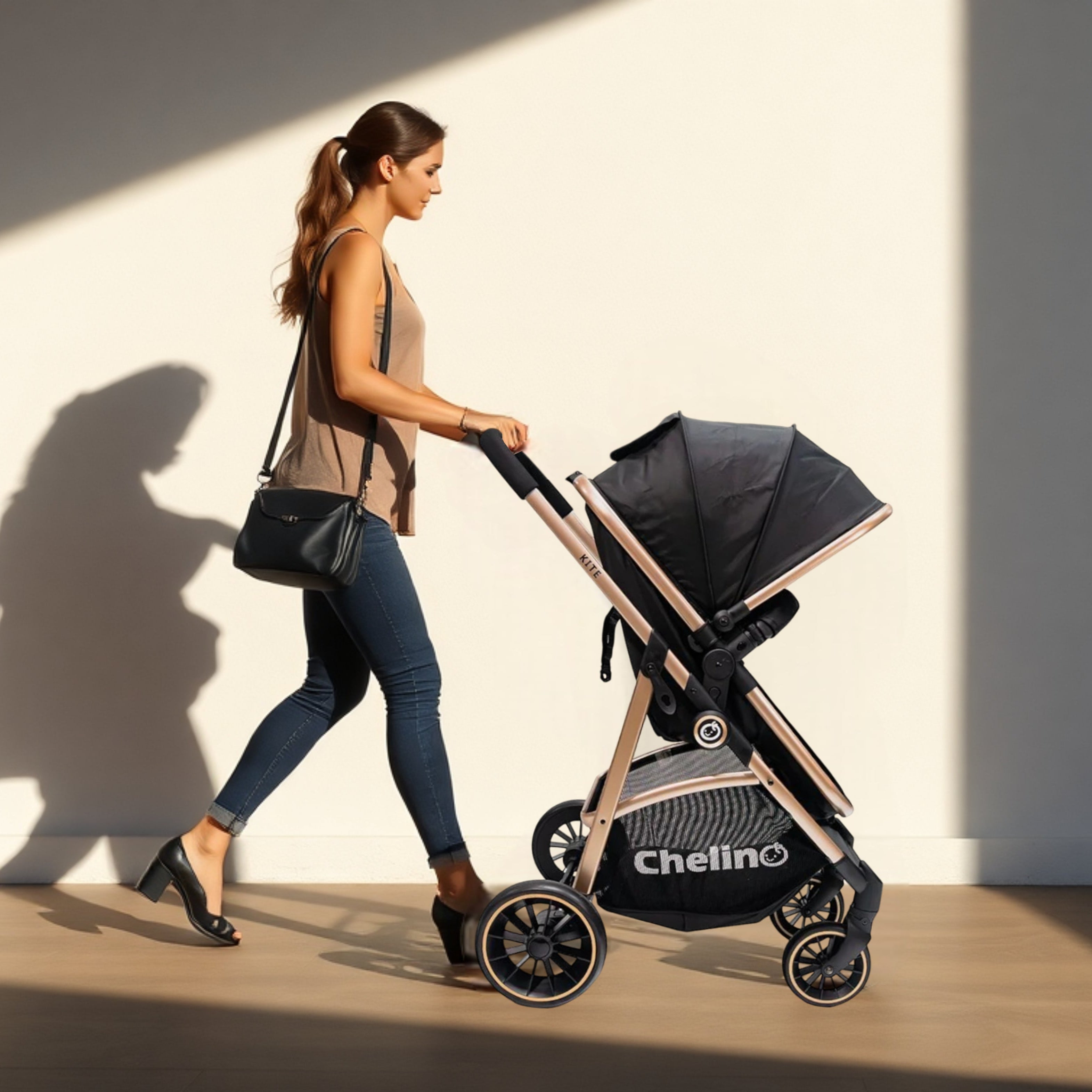 Woman pushing Kite 3 in 1 Travel System stroller in sunny setting.
