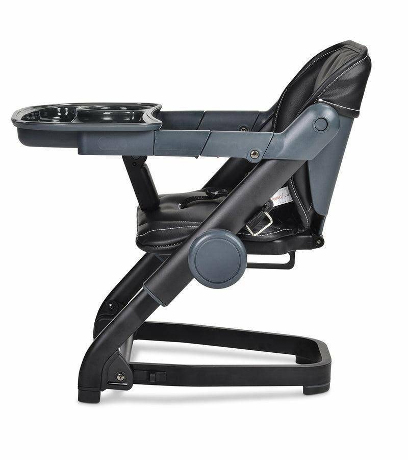 Feeding chair with adjustable height, secure harness, and removable tray.