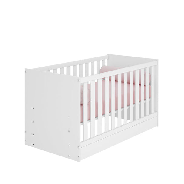 White Trinity 2 in 1 Convertible Baby Cot with pink bedding, designed to transition from crib to toddler bed