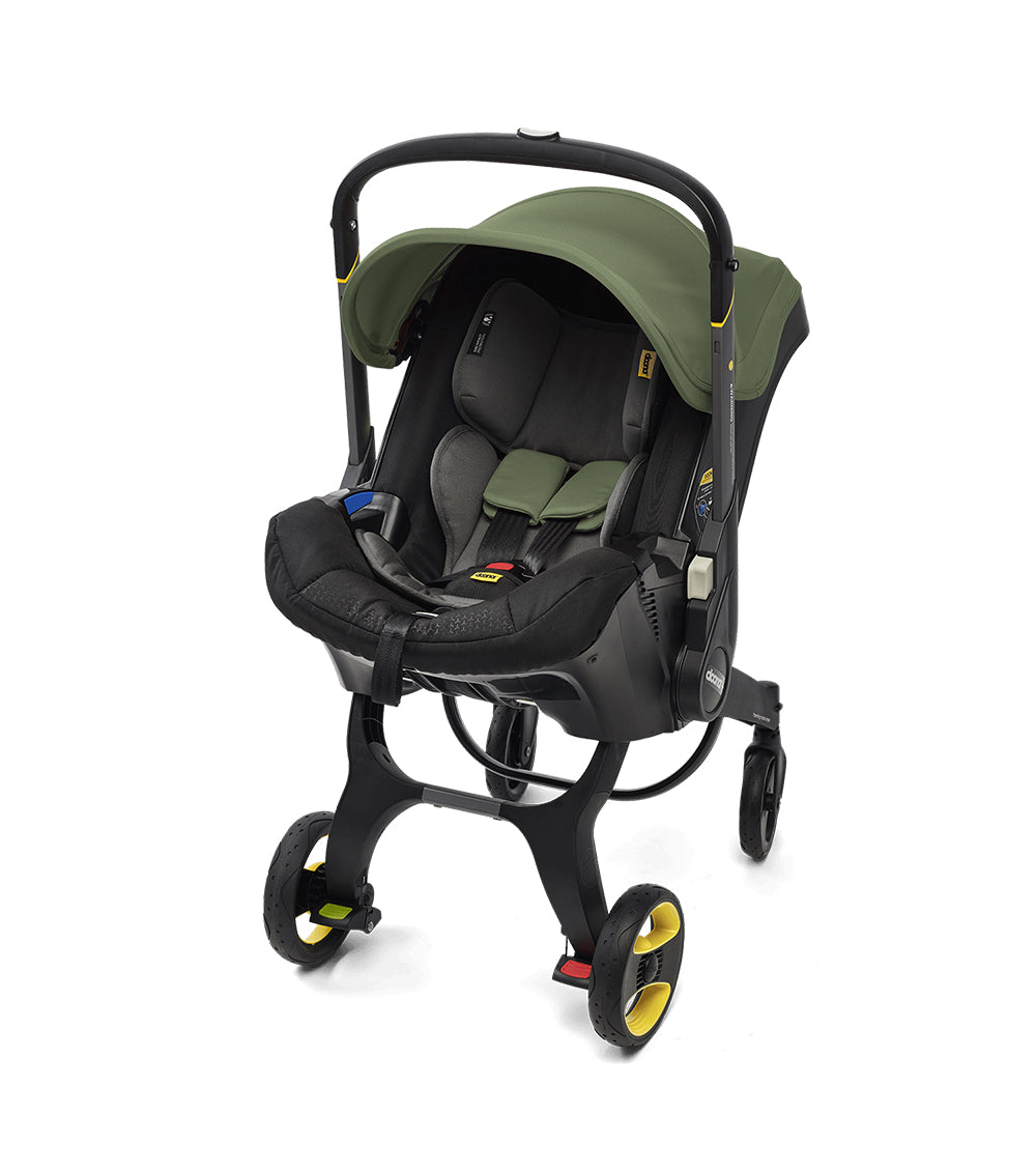 green car seat and stroller Doona + Car Seat & Stroller All-in-One for Easy Mobility