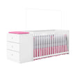 Modern white Teagan cot and all-in-one nursery station with attached dresser and pink bedding accents