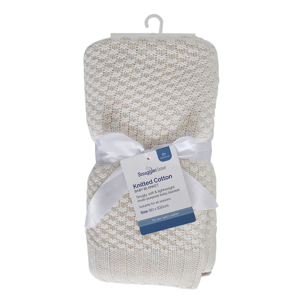 Knitted Cotton and Bamboo Baby Blanket in cream, with a soft open-knit pattern, ribbed edges and satin ribbon tie.