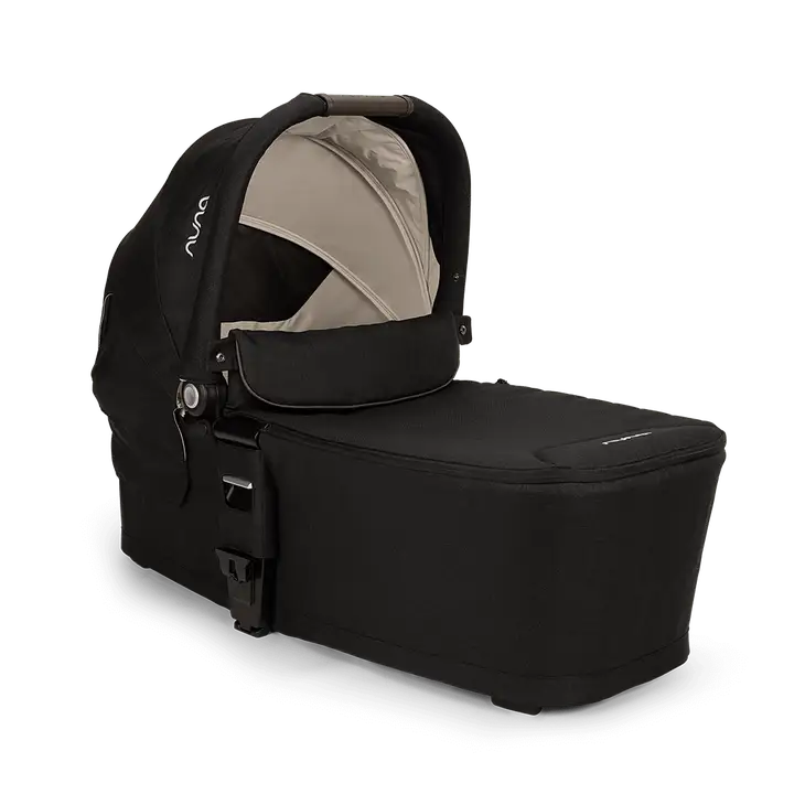 NUNA MIXX™ NEXT CARRY COTS attached to MIXX next pushchair with UPF 50+ canopy and rain cover for newborns up to 9 kg