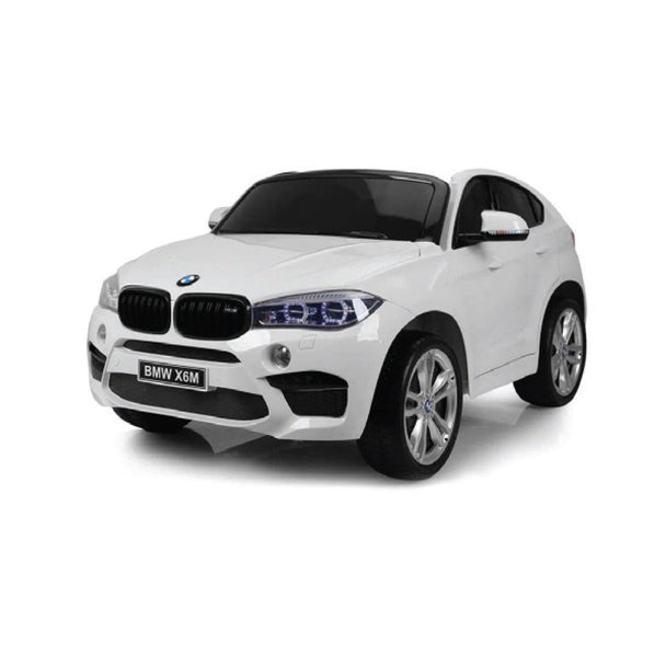 BMW X6 White Ride On Car for kids with realistic design, LED headlights, and safety seatbelt.