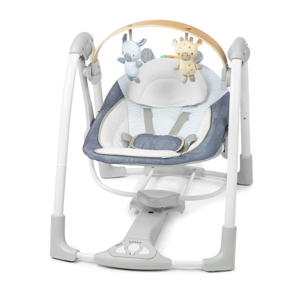 Ingenuity Swing 'N' Go Portable Swing in chambray with removable wooden toy bar, plush seat, 5 speeds, built-in music, and foldable design for easy storage.
