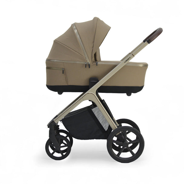 Mocca Lunar II carry cot with canopy and mesh window on stroller frame