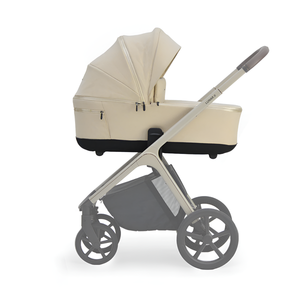 Beige Lunar II carry cot with canopy and mesh window attached to stroller frame for infants up to 9 kg