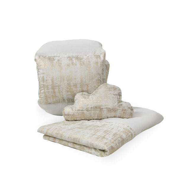 Plush Designer 5 Piece Set in white and gold foil, featuring cot bedding, bumper, and pillow.