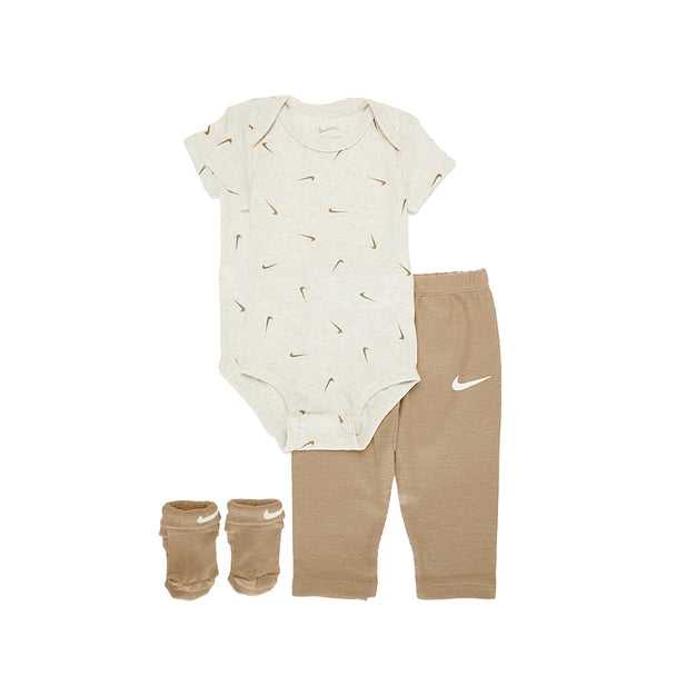 Nike NHN 3 Piece Bodysuit & Waffle Pant Set in Hemp color for infants, featuring bodysuit, waffle-textured pants, and socks with Nike branding.