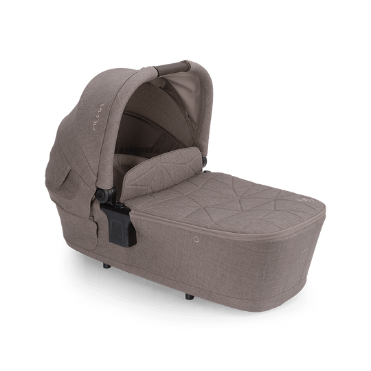 Nuna LYTL™ BMW infant carry cot in umber color for newborns with lie-flat comfort and compact fold design