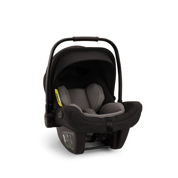 Nuna Pipa™ Next Infant Car Seat in Caviar, lightweight and versatile, with adjustable headrest and superior side impact protection.