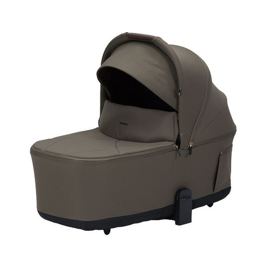 Lunar URBN Lux Carry Cot with plush interior and UPF 50+ canopy, foldable design, and integrated handle