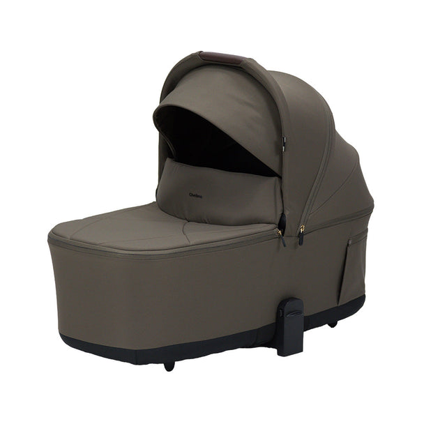Lunar URBN Lux Carry Cot with plush interior and UPF 50+ canopy, foldable design, and integrated handle