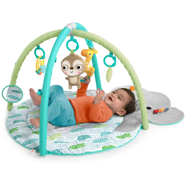 Baby on Hug n Cuddle Elephant Activity gym with attached toys.