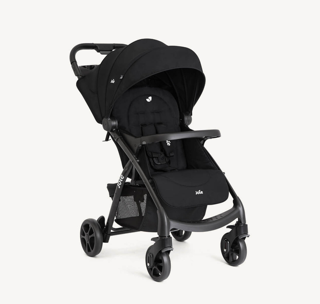 Joie Muze™ lx stroller in black fabric with a matching canopy, padded seat, safety harness and three-wheel frame