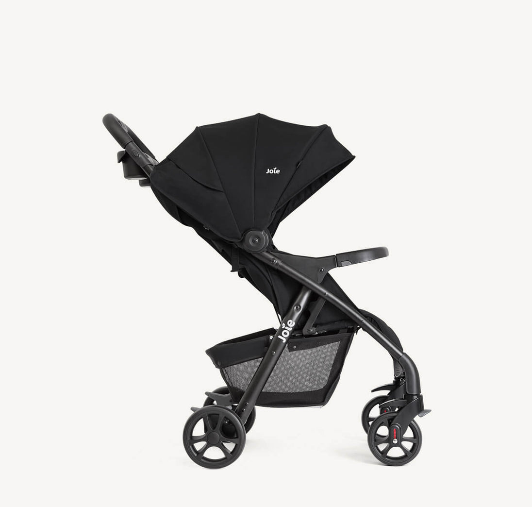Joie Muze™ lx stroller in black fabric with a wide canopy, padded seat, storage basket and three-wheel frame