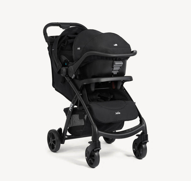 Joie Muze™ lx travel system with a black infant car seat attached to a matching stroller, featuring a canopy and storage basket
