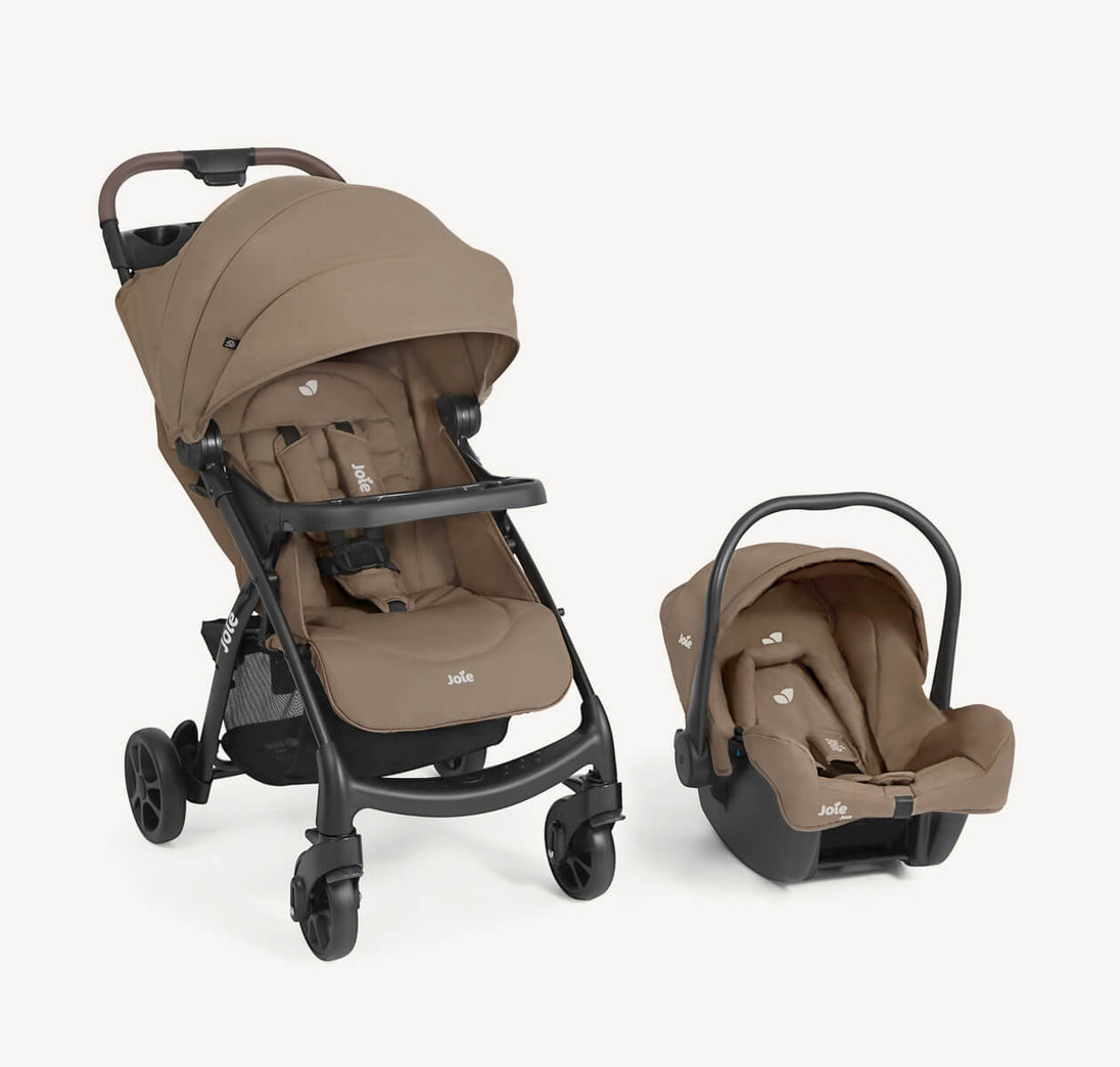 Joie Muze™ lx travel system with a taupe stroller and matching infant car seat, featuring black frames and canopies