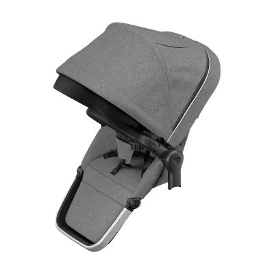 Thule Sleek Sibling Seat attached to stroller, showing reversible reclining double seat for comfort